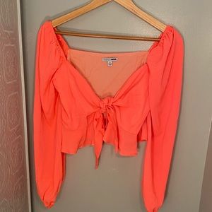 Bright coral pink long sleeve tie up top, size XS